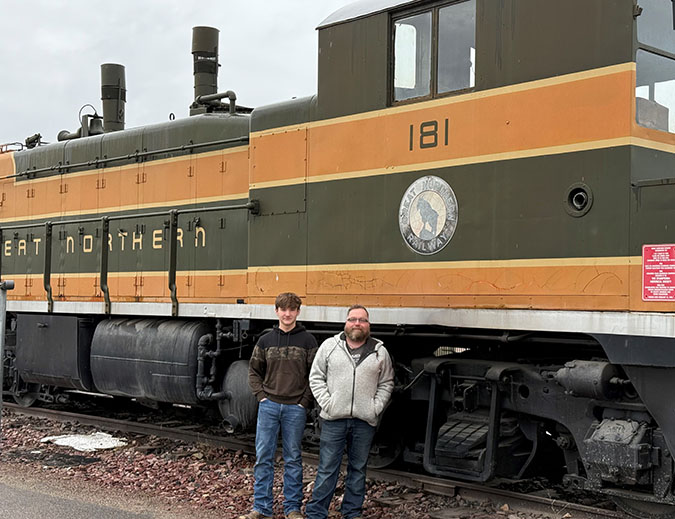 Xander and his dad in front of an old Great Northern switch engine at BNSF’s depot in Whitefish.  